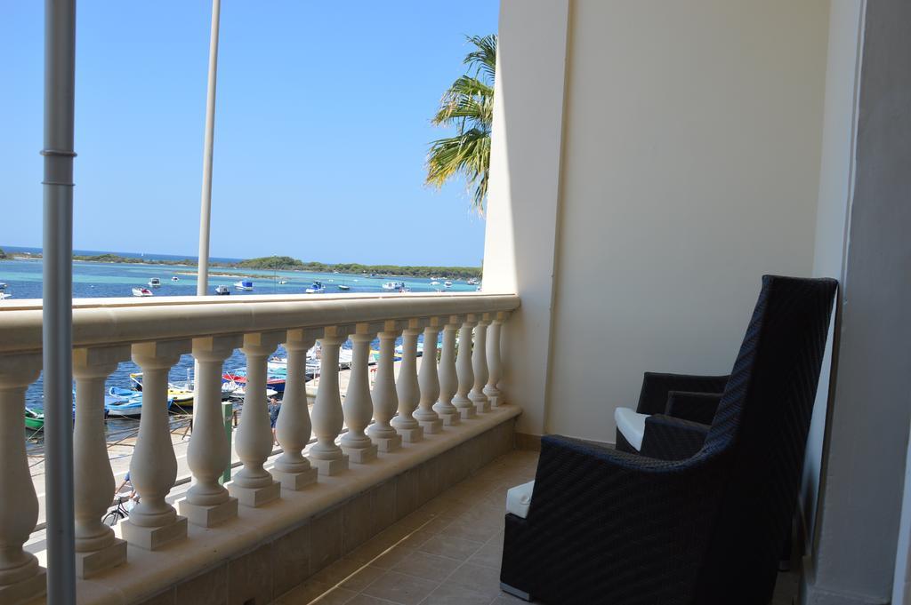 L'Angulus Ridet Hotel Porto Cesareo Bagian luar foto